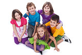 Group of kids sitting on the floor