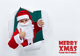 Santa popping out of torn edges hole with thumbs up sign
