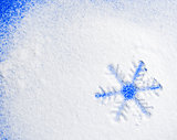 Snowflake on the snow.