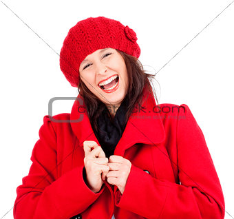 Young Woman in Red Coat and Cap Laughing 