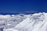 Off-piste slope and snowy plateau at nice day