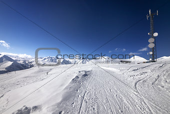 Ratrac ski road at nice sun day