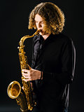 Teenager playing the saxophone