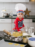 Young boy making cookies