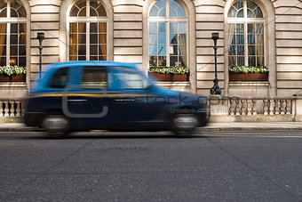 Taxi in motion in London