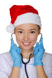Christmas doctor with stethoscope iand gloves