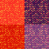Different colors seamless abstract triangles backgrounds set