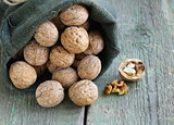 linen bag with whole ripe walnuts