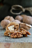 macro shot of walnuts on wooden background