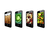 mobile phones with images of different vegetables