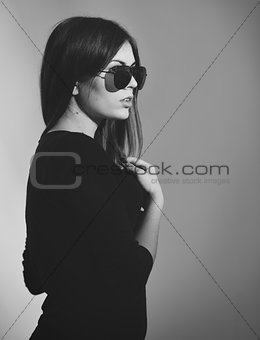 Street fashion portrait of young woman