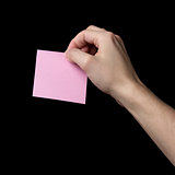 adult man hand holding sticky note