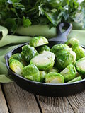 fried green brussels sprouts in the pan