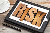 risk - word on digital tablet
