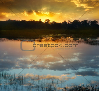 Sunset Over A Lake 