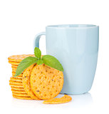 Stack of crackers with mint and cup of drink