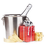 Champagne bottle in bucket and gift boxes