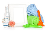 Photo frame with beach towels and toys