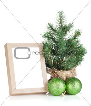 Photo frame, christmas tree and baubles