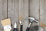 Set of tools on wood background