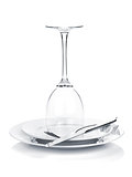 Silverware or flatware on plates and wine glass