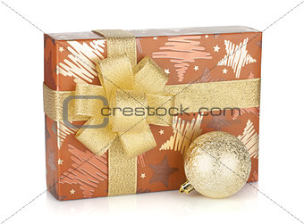 Gift box with ribbon, bow and christmas decor