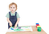 cute girl painting on small desk