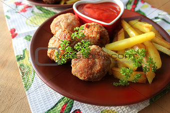 Meat balls with sauce and potatoes