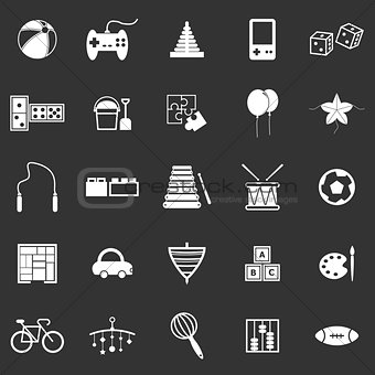 Toy icons on black background