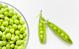 Fresh green peas on white background 