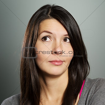 Attractive woman with a sceptical expression