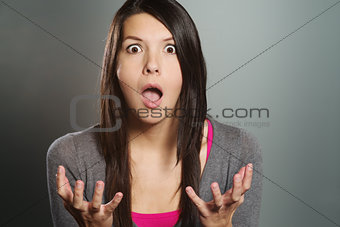Young woman with a horrified expression