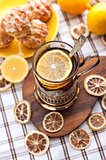 Black tea with lemon in the silver glass-holder