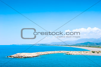 Artificial breakwater in shallow warm waters of the Mediterranean Sea.