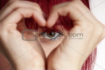 woman shows heart