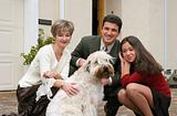 Happy family with a dog
