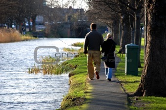 Couple walking near Grand Canal in Dublin