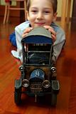 A child plays with the cars