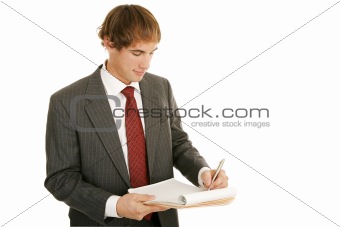 Young Businessman Taking Notes