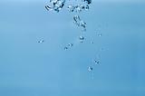 air-bubbles rising through water
