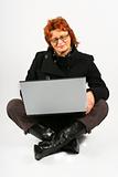 businesswoman sitting with laptop