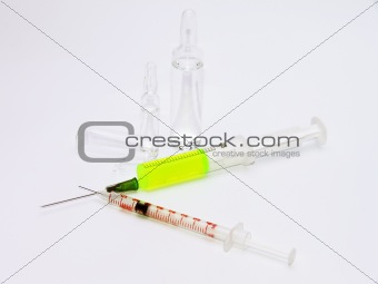 Two syringes and broken ampules