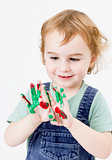 cute little girl with finger paint