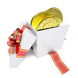 Gold coins in a gift box