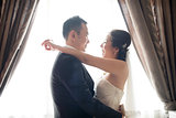 Asian Chinese wedding couple dancing