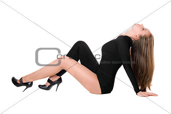 Young woman in a black tight-fitting body suit dance