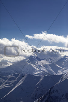 Snowy mountains at evening