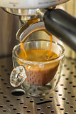 preparing a strong espresso cofffe with a coffee machine
