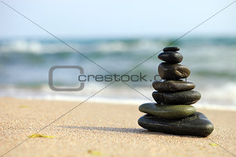 Stack of sea pebbles on the beach