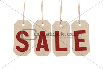 four brown tags with word sale